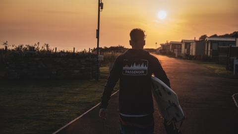 Scottish Surfer, Scott Mitchell heads from St Andrews Holiday Park to East Sands