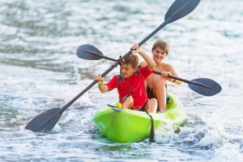 Boys sea kayaking