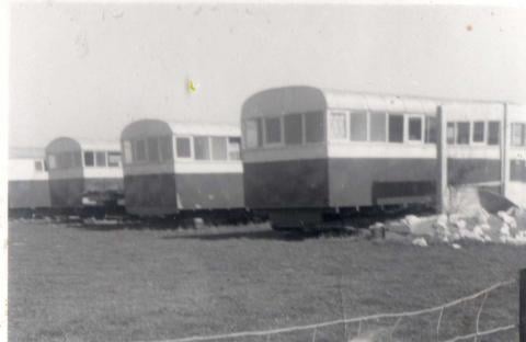 Old black and white photo of statics at Abbeyford Caravan Park