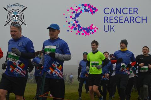 Abbeyford Leisure team members raise money for Cancer Research UK