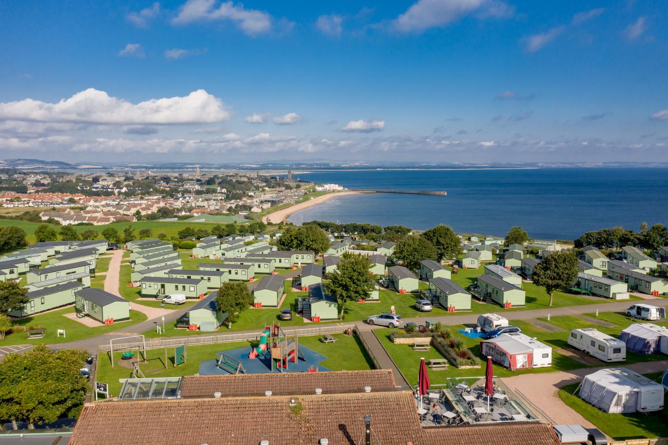 Aerial view of Spires View Tourer and Tent Field on a sunny, summer's day