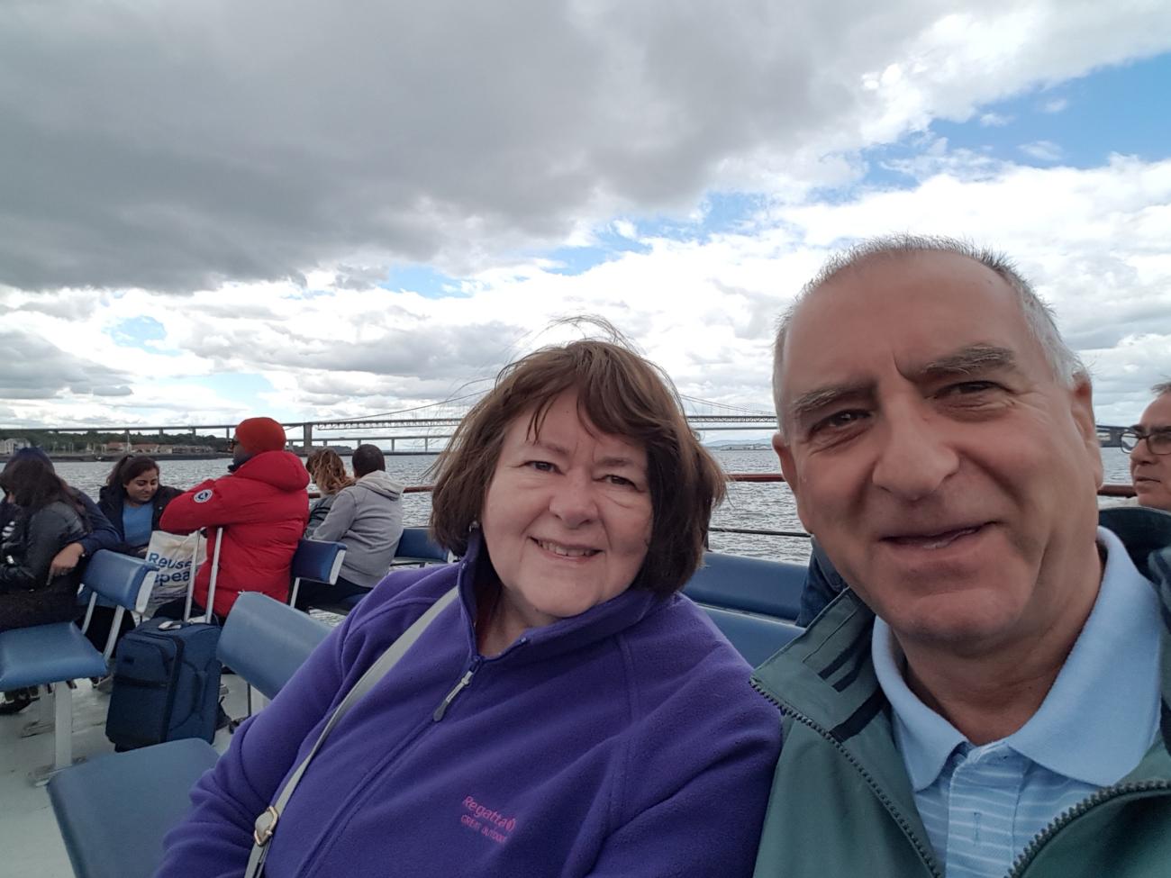 Robert and his wife Sylvia enjoying a boat trip on the Forth
