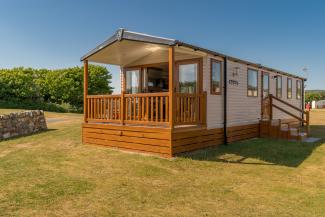 Castaway holiday home in grassy location
