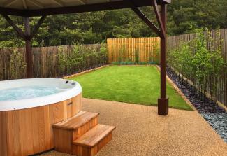 Lodge hot tub in garden