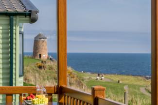 breakfast on veranda with sea views