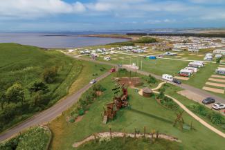 Aerial view of Forth View Touring Field at Elie Holiday Park on a sunny day
