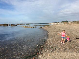 Girl on beach at Largo Bay