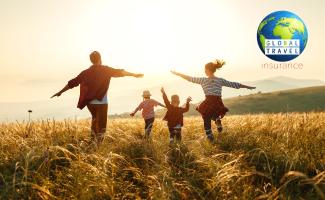 Family running through cornfield