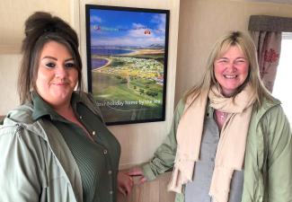 Team members from the Cottage Family Centre visit their holiday home for the first time