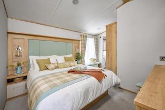 The Ambleside master bedroom with ensuite