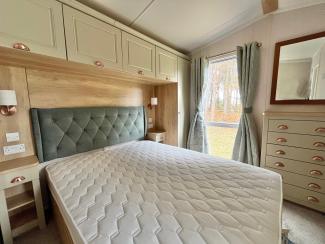 The Vendee - master bedroom with forest views