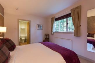 Valentines Cottage - double bedroom with garden views